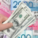 Dólar sube 19 cts. y era vendido a $61.60; el euro bajó a $70.23